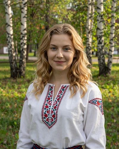 Lithuanian woman Ruta in a sunlit park in Kaunas Lithuania