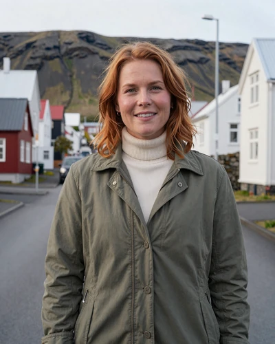 Icelandic woman Thordis near a mountain street in Akureyri northern Iceland