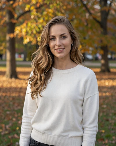 German woman Katharina in a Munich park during autumn
