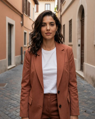 Italian woman Sofia on a charming cobblestone alley in Monti neighborhood Rome