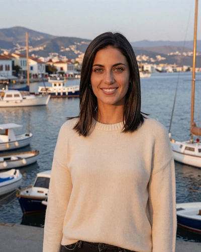 Greek woman Dimitra at the harbor viewpoint in Patras with Ionian Sea behind