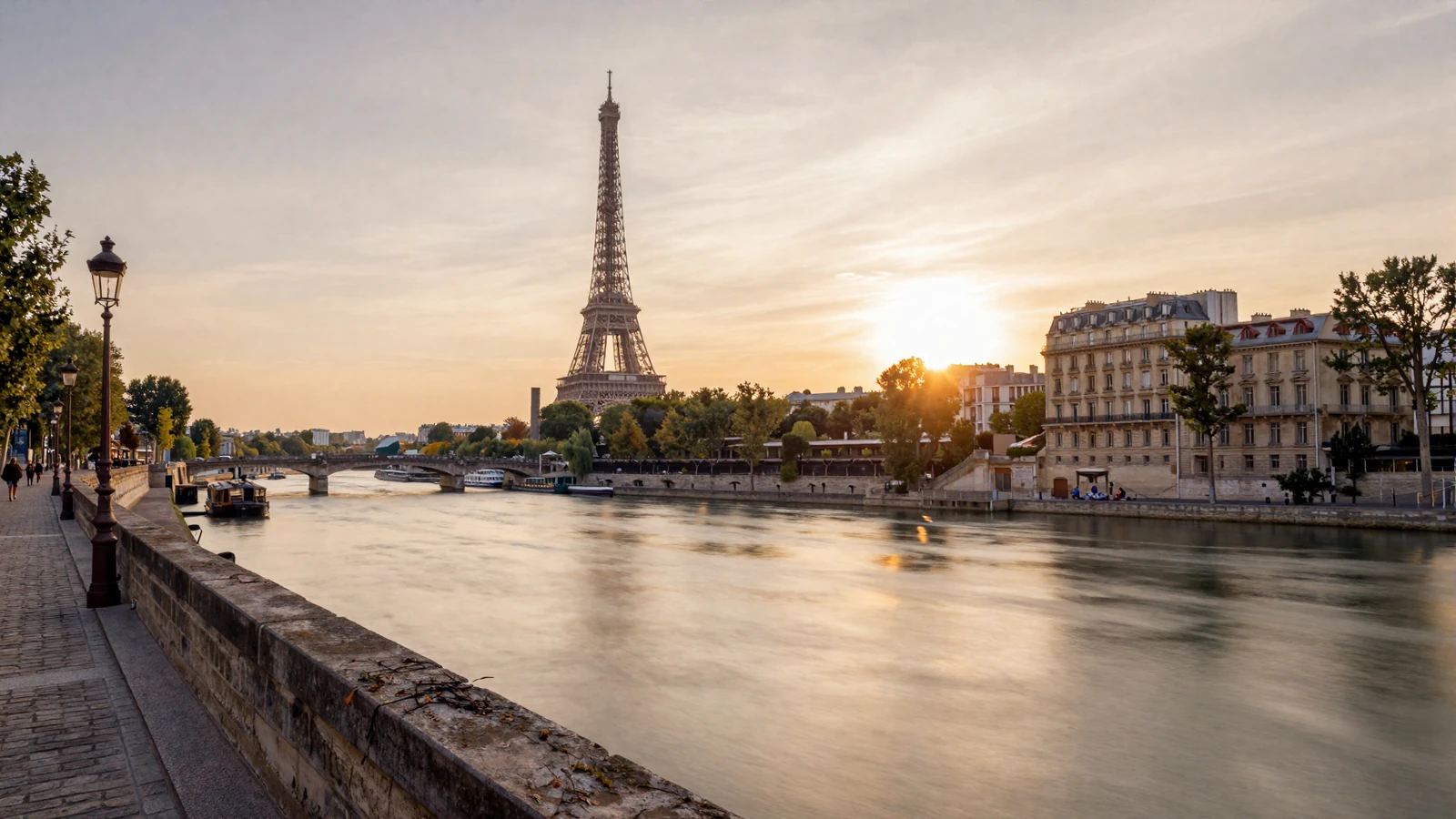Romantic Paris cityscape at golden hour with Eiffel Tower and the Seine for French women dating
