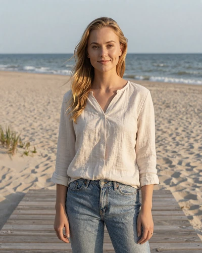 Estonian woman Kadri on Pärnu beach boardwalk with Baltic Sea in the background